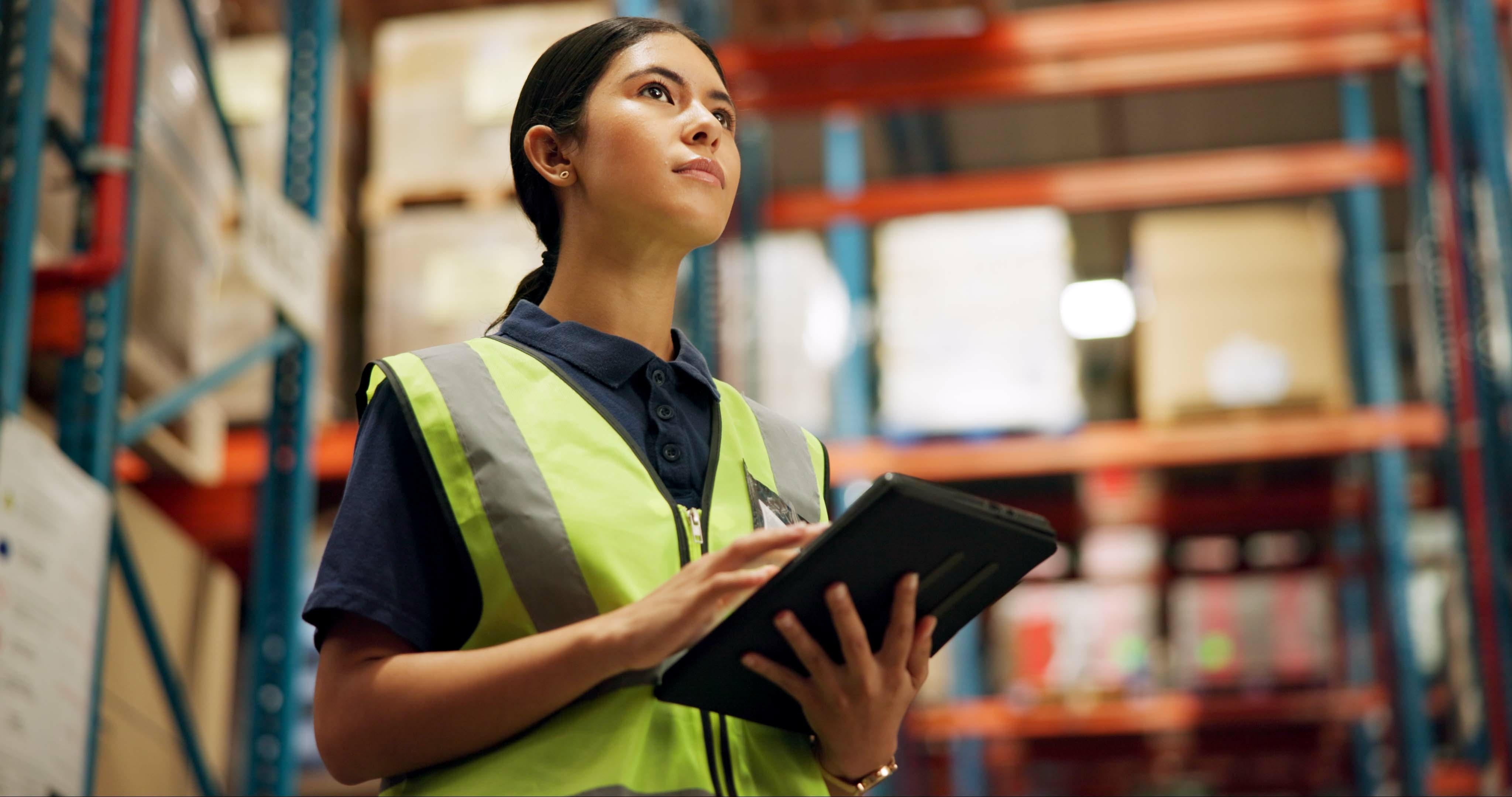Quality management auditor reviewing documentation